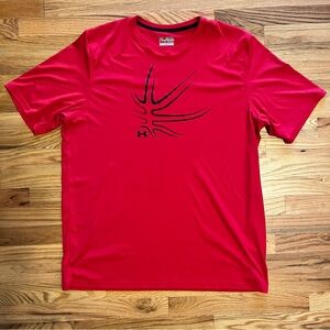 Under Armour quick dry 2X Loose “Protect This House” rallying cry Tshirt. NWOT.